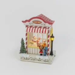 New The Jolly Christmas Shop 8.8" Battery Operated Santa Candy Shop Spinning Water Globe Christmas Decoration 2597390