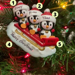 The Jolly Christmas Shop 3.75" Family Of 3 Penguins On Sled Personalized Christmas Ornament OR1915-3