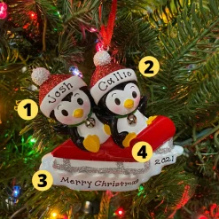 The Jolly Christmas Shop Penguin Couple On Red Sled Personalized Christmas Ornament OR1915-2
