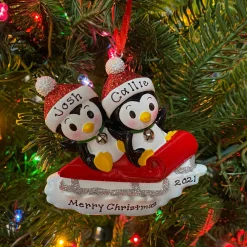The Jolly Christmas Shop Penguin Couple On Red Sled Personalized Christmas Ornament OR1915-2